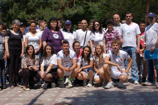A group of people in Romania pose for a photo on World MS Day
