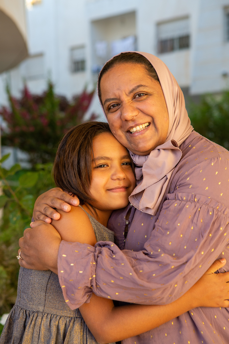 Sanae and her daughter outside their home in Fes, Morocco.