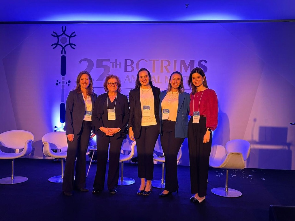 Image of 5 women at a conference in Brazil